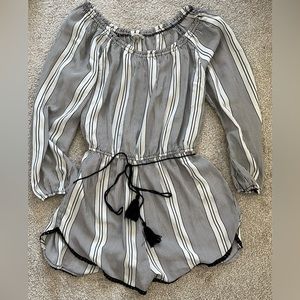 Black and white stripe romper with waist tie.